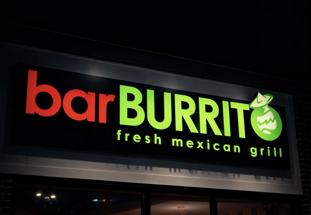 barBURRITO — illuminated light box sign with mixed red and green lettering at night